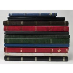eleven used stockbooks of different sizes